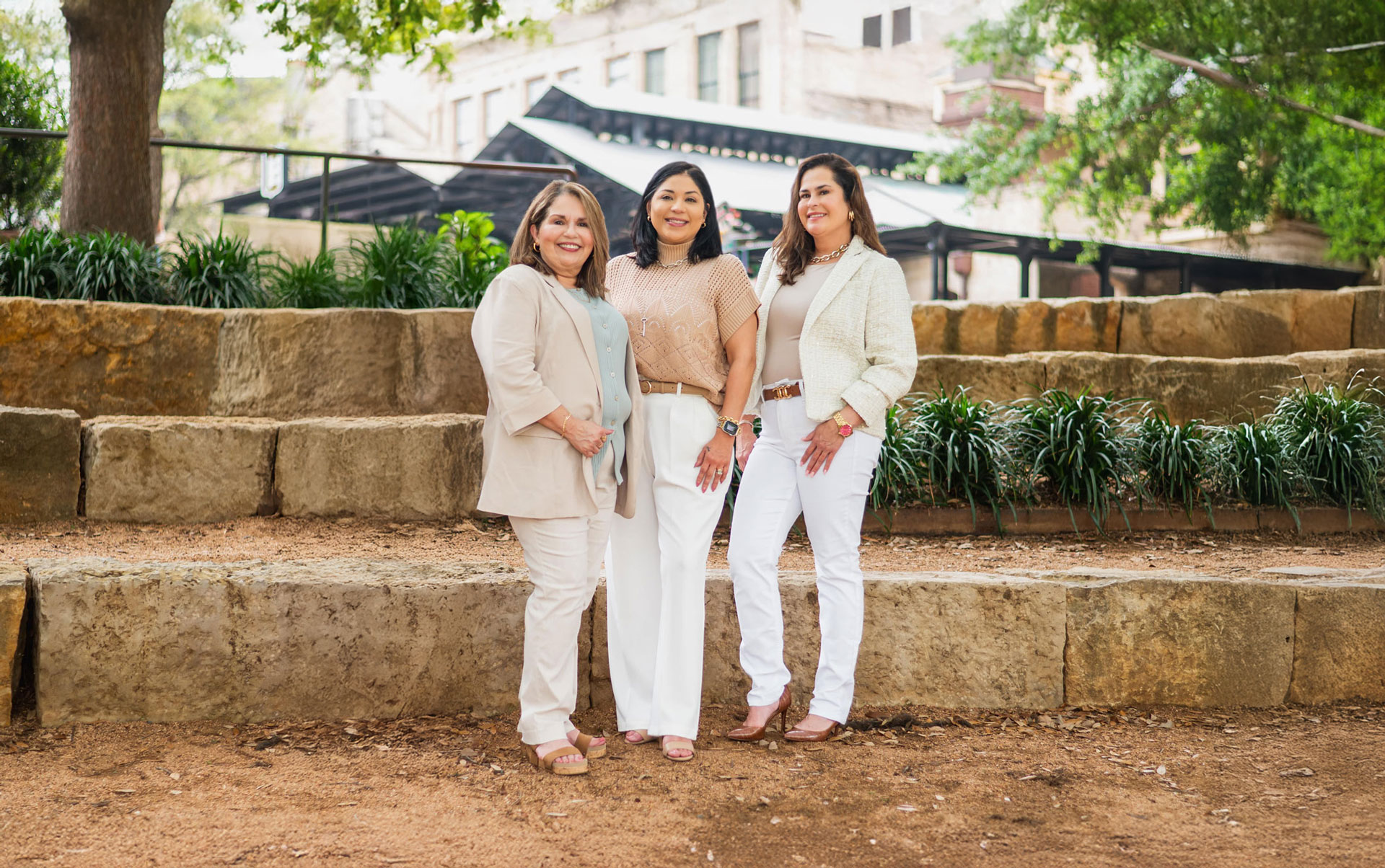 Rental Property Professional Team Standing In Front Of Stairs Full Image