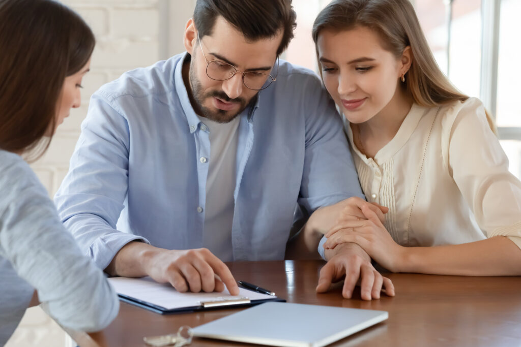 Renter reading lease terms before signing.
